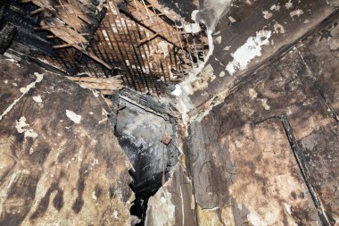 KHARKIV, UKRAINE - Aug. 01, 2022: Burnt and damaged city hospital in the historical building in Kharkiv. Destroyed building in historical downtown as a consequences of Russian shelling in Kharkiv