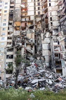 KHARKIV, UKRAINE - Jul. 29, 2022: Destroyed residential apartment building as a consequences of Russian missile shelling  in the area of North Saltivka, Kharkiv, Ukraine