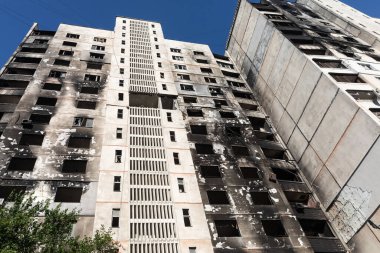 KHARKIV, UKRAINE - Jul. 29, 2022: Destroyed residential apartment building as a consequences of Russian missile shelling  in the area of North Saltivka, Kharkiv, Ukraine