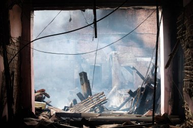 KHARKIV, UKRAINE - Jul. 30, 2022: The ruins of a completely damaged building of a specialized school as a result of a rocket attack by Russian invaders.