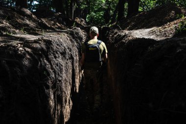 KHARKIV Reg, UKRAINE - Jul. 31, 2022:  War in Ukraine. Soldiers of the Armed Forces of Ukraine on defense line near Kharkiv, Ukraine