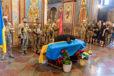 KYIV, UKRAINE - Aug. 25, 2022: Funerals of the Ukrainian soldier Yuriy Karakai who died from mortar fire in the battle in Kherson region