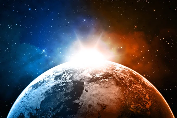 Planet earth with sunrise in the space