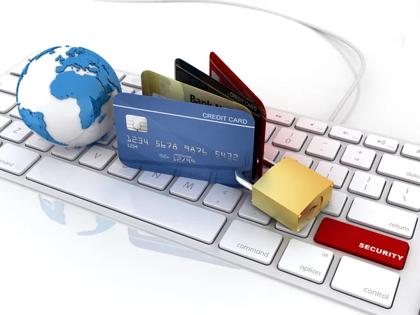 O cadeado em um cartão de crédito jaz no teclado — Fotografia de Stock