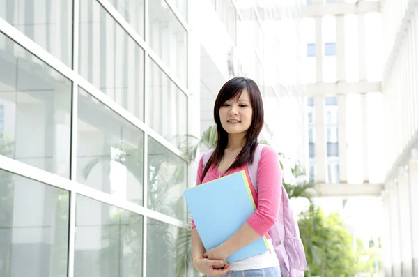 College Student standing outside college building — Stock Photo, Image
