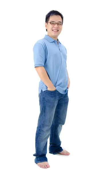 Happy asian male in jeans — Stock Photo, Image