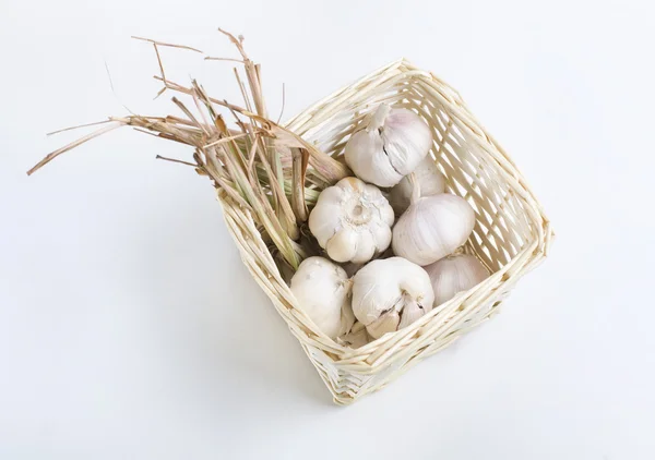 Raw garlic and dried lemon grass — Stock Photo, Image