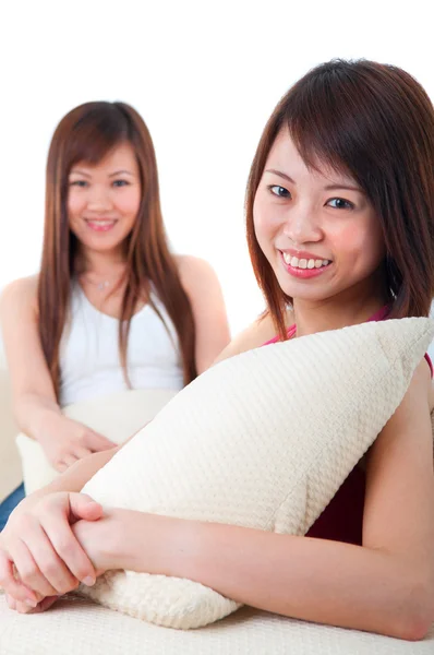 Asian girls on sofa — Stock Photo, Image
