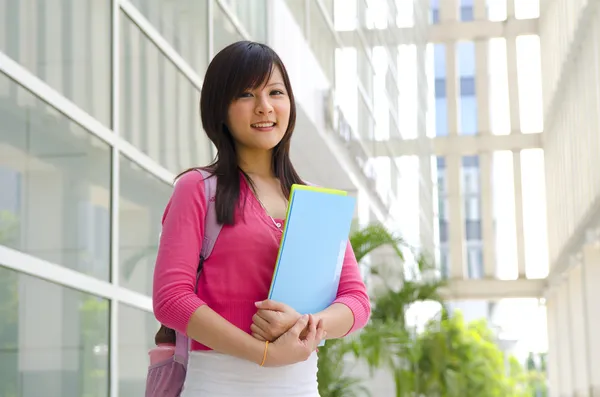 College Student standing outside college building — Stock Photo, Image