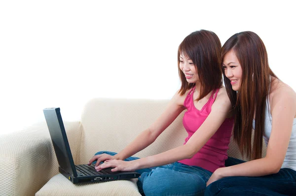 Asian girl on sofa Stock Image