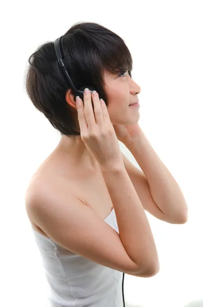 Asian girl listening to mp3 — Stock Photo, Image