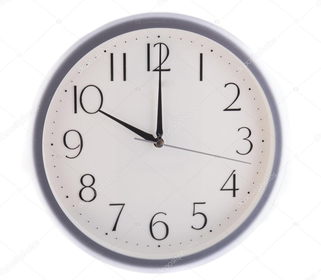 Isolated white clock at ten
