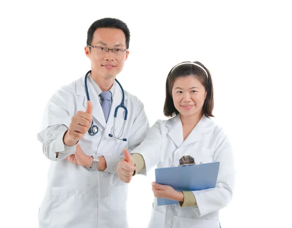 Asian doctors giving thumbs up — Stock Photo, Image