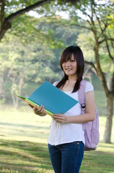 Asian college girl studying outdoor — Stock Photo, Image