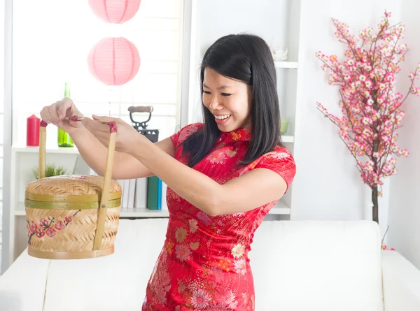 Asian female celebrating chinese new year — Stock Photo, Image