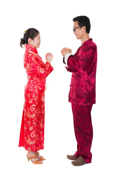 Asian couple celebrating chinese new year in traditional clothes — Stock Photo, Image