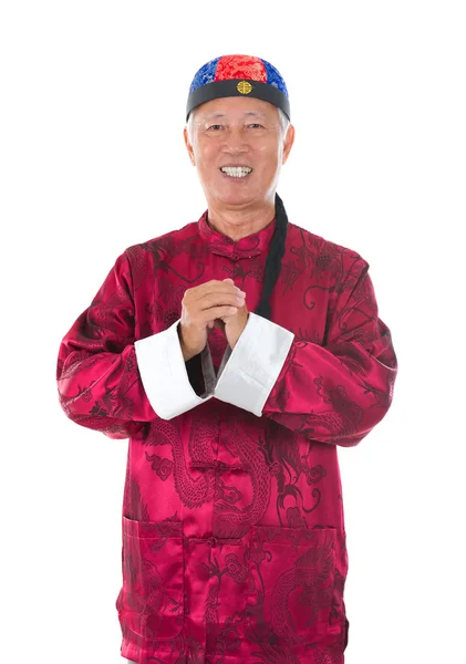 Asian senior chinese man celebrating lunar new year, with tradi — Stock Photo, Image