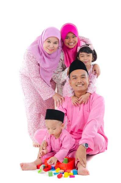 Indonesian family having fun during hari raya — Stock Photo, Image