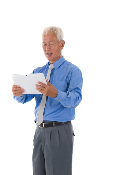 Chinese senior business male with tablet — Stock Photo, Image