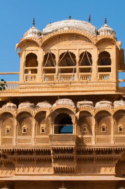 The beautiful Haveli palace made of golden limestone in Jaisalm clipart
