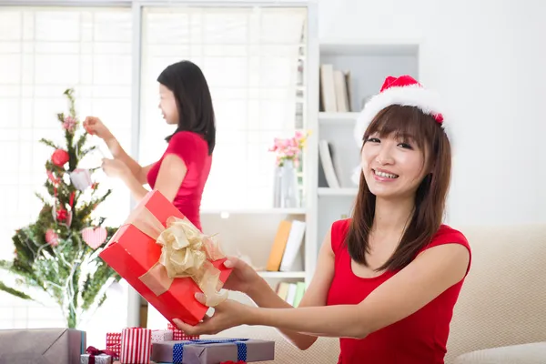 Korean girl friends during christmas celebration — стоковое фото