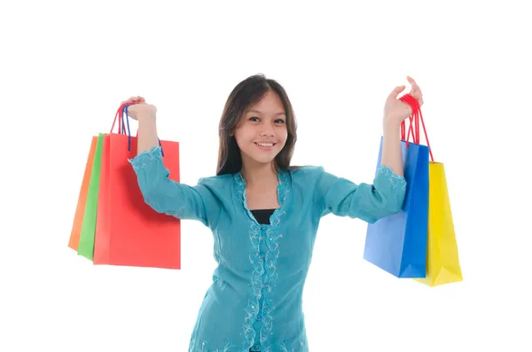 Happy young malay girl during shopping festival with white backg — Stock Photo, Image