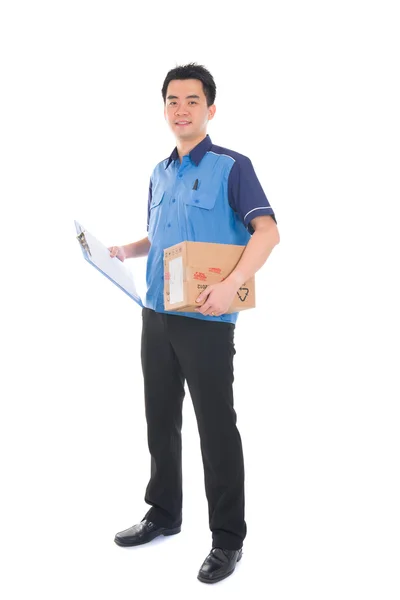 Asian delivery dispatch boy delivering a package isolated agains — Stock Photo, Image