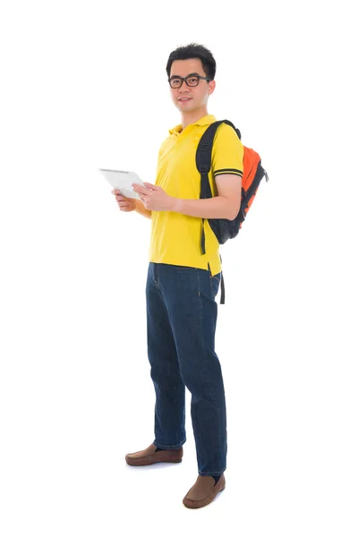 Asian male student holding a tab and bag with isolated white bac — Stock Photo, Image