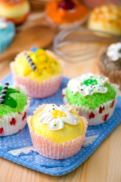 Cup cakes with a lot of bread pastry background — Stock Photo, Image