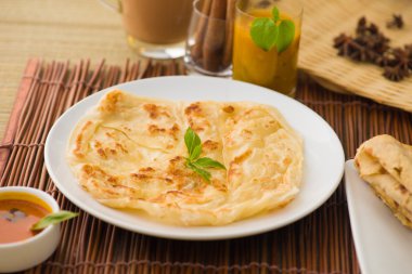 roti canai ve Tarık, çok ünlü içecek ve yiyecek Malezya