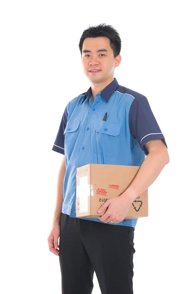 Asian delivery dispatch boy delivering a package isolated agains — Stock Photo, Image