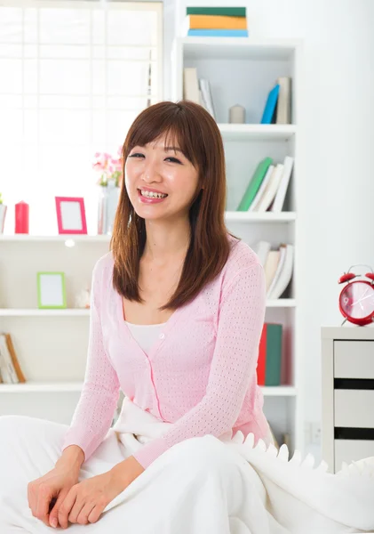 Chinese Asian girl female waking up on bed — Stock Photo, Image