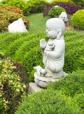 Limestone buddha monk statue clipart