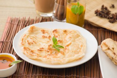 roti canai düz ekmek, Malezya, her zamanki gibi çok ünlü mamak gıda