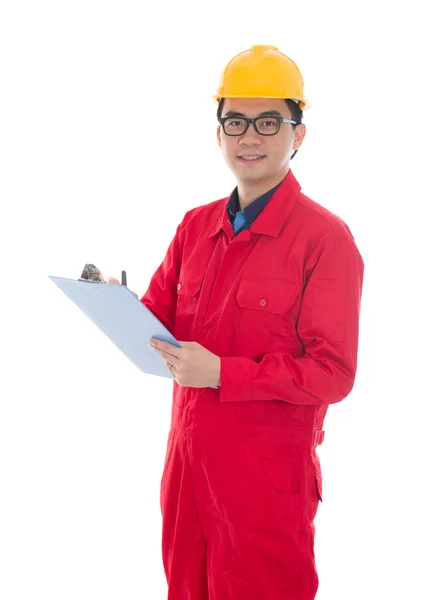 Asian chinese male in safety heavy writing notepad suit and isol — Stock Photo, Image