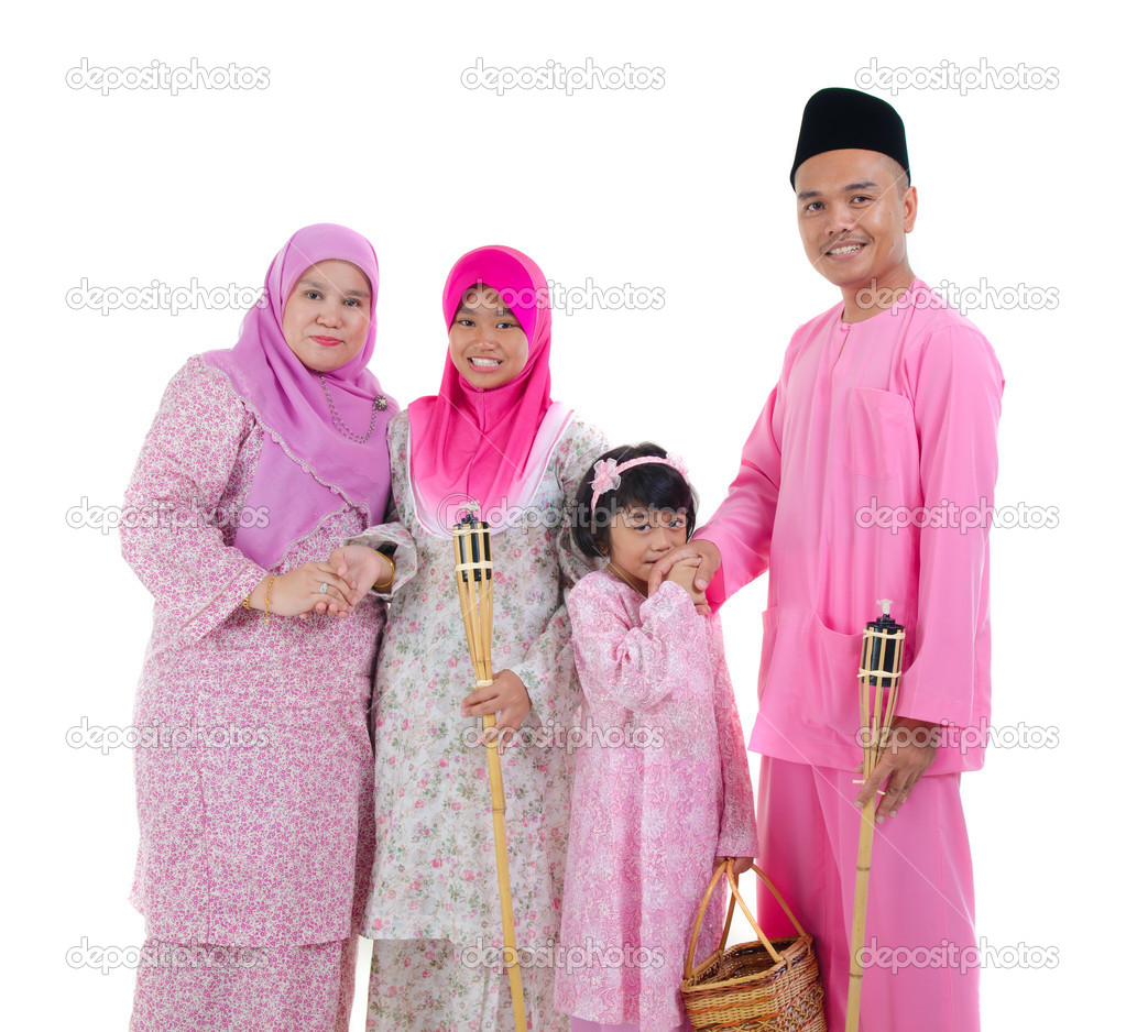 Malay indonesian family during hari raya occasion isolated with