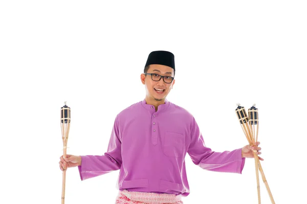 Malay man celebrating hari raya the month after ramadan — Stock Photo, Image
