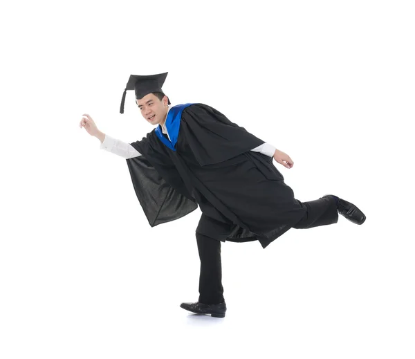 Graduado universitario chino corriendo hacia el mundo corporativo — Foto de Stock