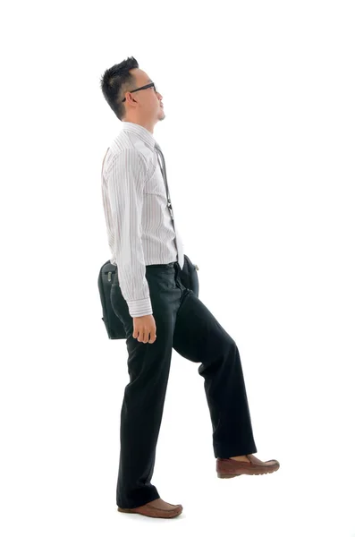 Malay business man walking with smiling expression, full length — Stock Photo, Image