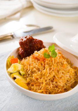 Biryani chicken rice cooked in arab style tajine with traditiona clipart