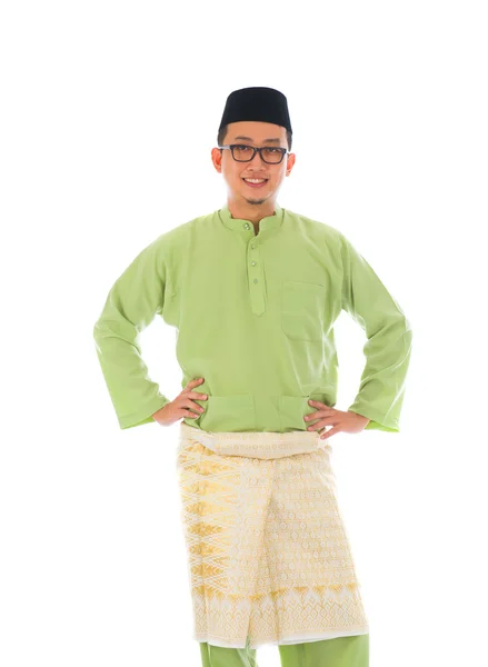 Macho indonesio durante el festival de ramadán con espalda blanca aislada —  Fotos de Stock