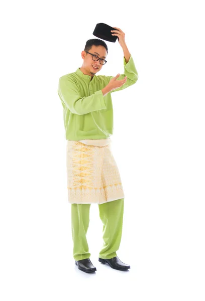 Asian muslim male with traditional Malay costume in smiling acti — Stock Photo, Image