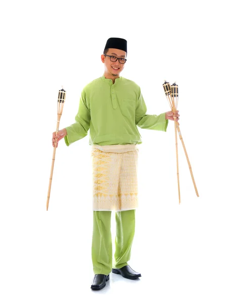 Malay man celebrating hari raya the month after ramadan — Stock Photo, Image