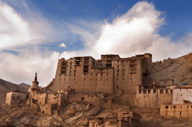 Leh Monastery looming over medieval city of Leh, ladakh clipart