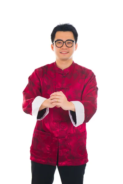 Asiatico uomo con cinese tradizionale abito cheongsam e gong xi f — Foto Stock