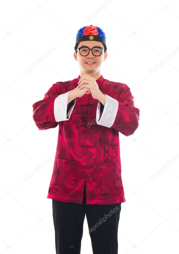 Asian man with Chinese traditional dress cheongsam and gong xi f