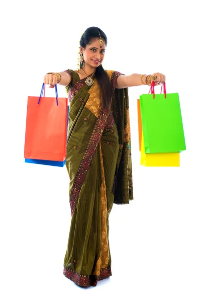 Traditional indian woman doing diwali shopping with isolated whi — Stock Photo, Image