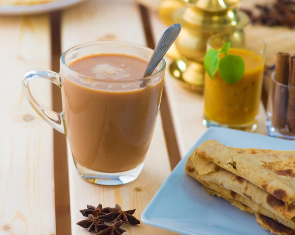 Roti canai and teh tarik, very famous drink and food in malaysia — Stock Photo, Image