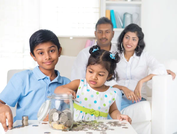Indian parents teaching children