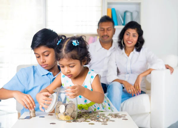 Indian parents teaching children — Stock Photo, Image